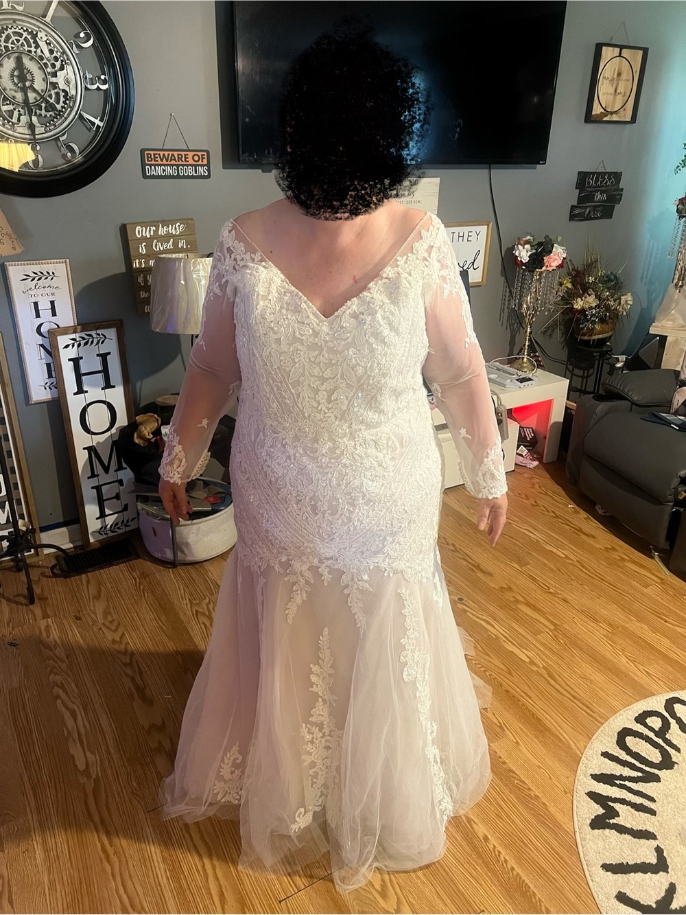 Oleg Cassini Ivory Lace Mermaid Wedding Gown with Sheer Long Sleeves